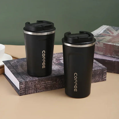 Insulated mug for keeping drinks hot or cold on the go.