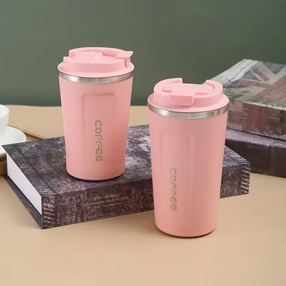 Insulated mug for keeping drinks hot or cold on the go.