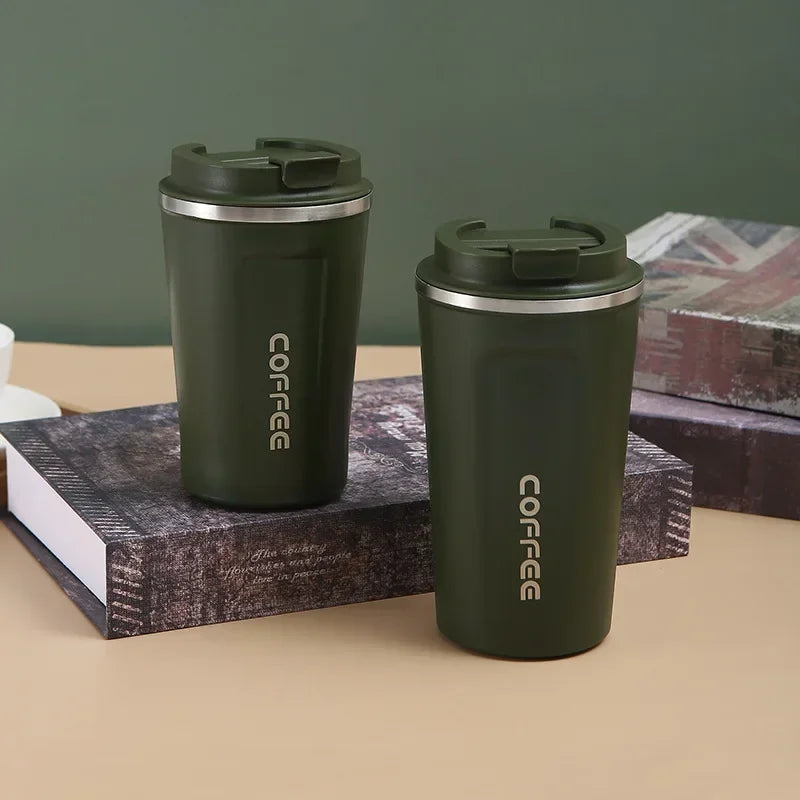 Insulated mug for keeping drinks hot or cold on the go.