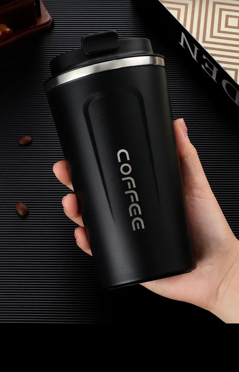 Insulated mug for keeping drinks hot or cold on the go.