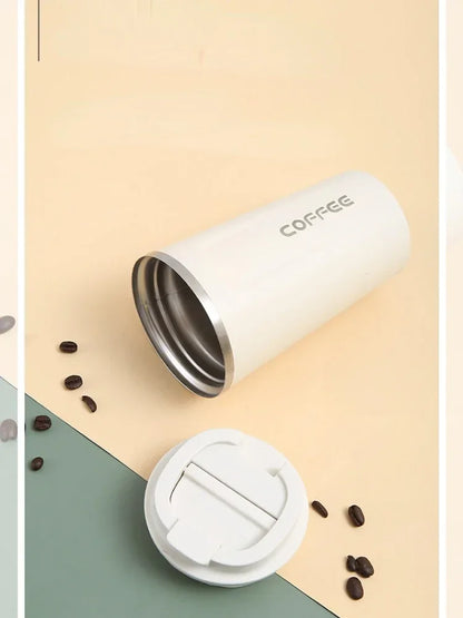 Insulated mug for keeping drinks hot or cold on the go.